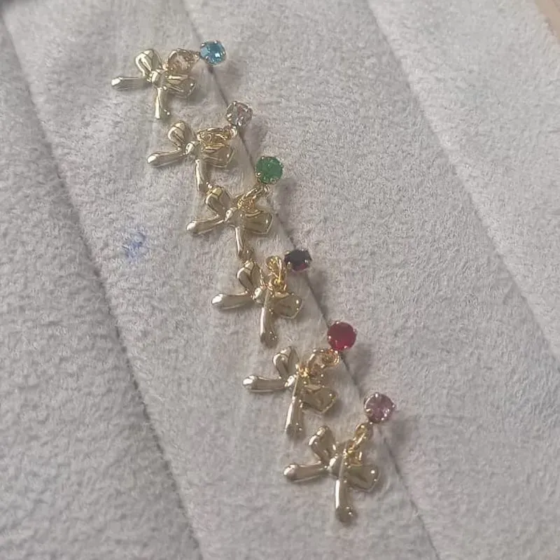 Brinco Infantil Ponto de Luz Laço