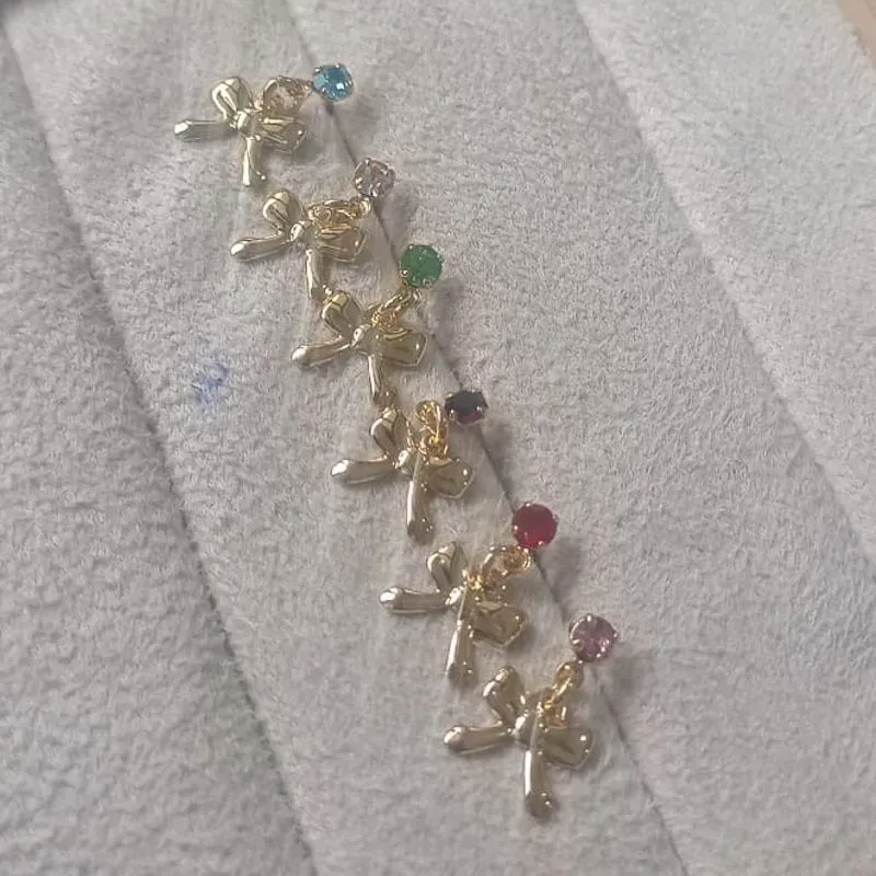 Brinco Infantil Ponto de Luz Laço